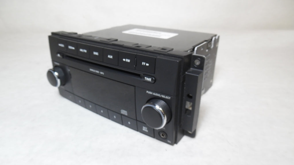 Pre-Owned 2009 2010 2011 Dodge Caravan CD MP3 Player Radio Receiver X711627