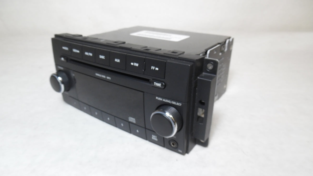 Pre-Owned 2009 2010 2011 Dodge Caravan CD MP3 Player Radio Receiver X711627